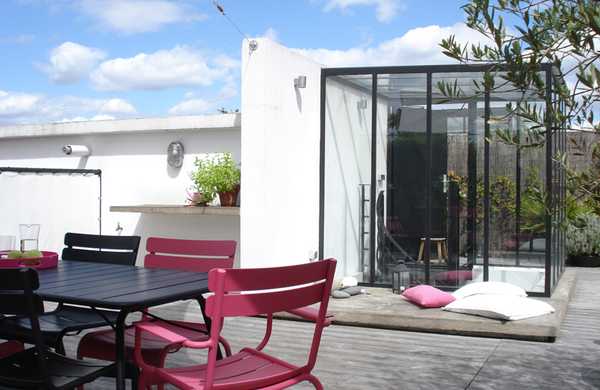 Transformation d'un toit en terrasse végétalisée style Loft par un architece paysagiste à Quimper